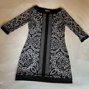White House/Black Market brand black and white tunic